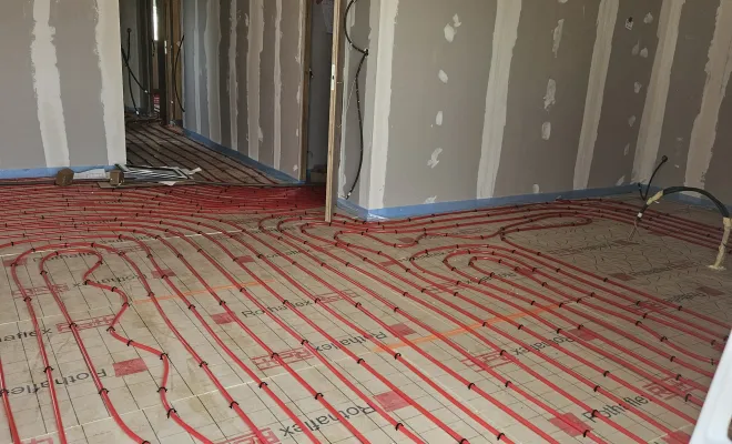Réalisation d'un plancher chauffant hydraulique avec pompe à chaleur sur le pavillon d'Abbeville Saint-Lucien, Compiègne, LCDT La Coopérative des Travaux